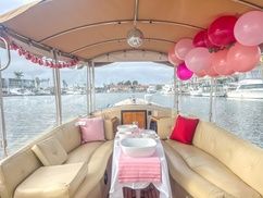 Party decorated boat interior with balloons