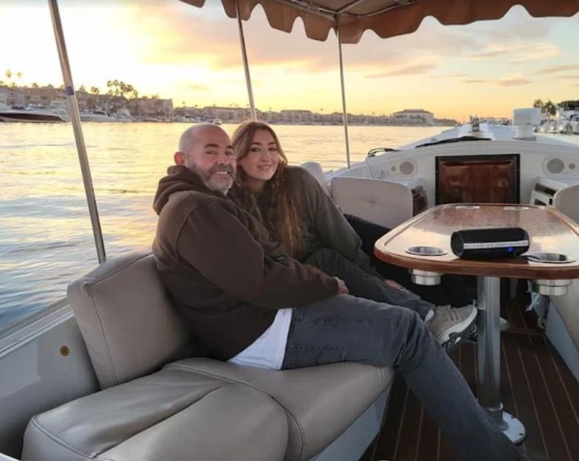 Couple enjoying sunset cruise