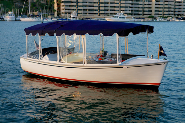 Duffy boat at golden hour sunset
