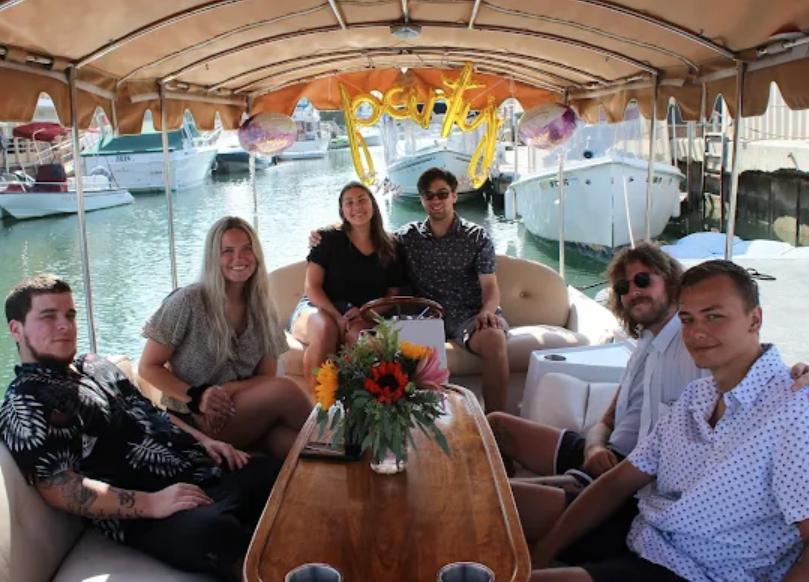 Friends celebrating on boat