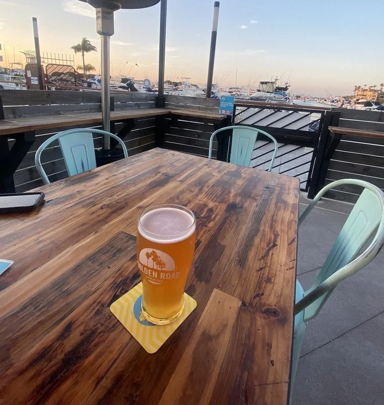 Golden Road Brewing patio with harbor views
